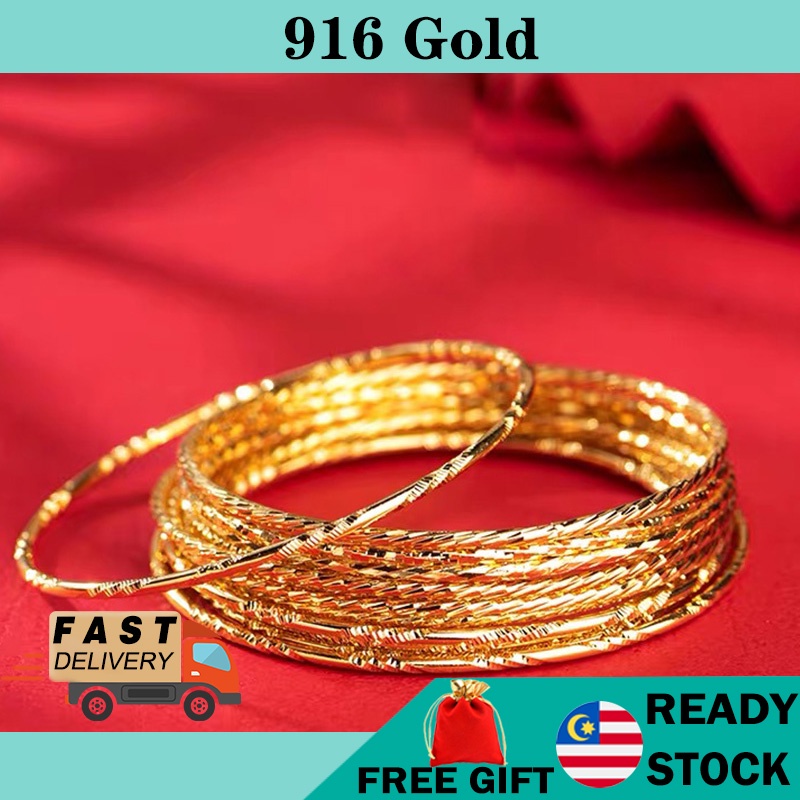 Gold bangle bracelet with on sale circles