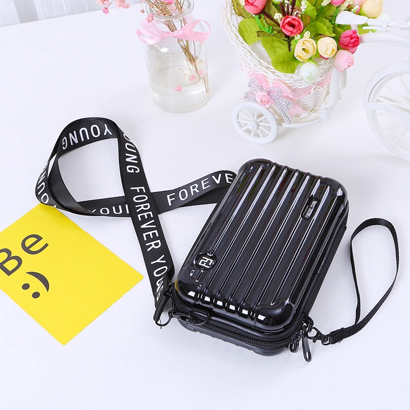 Mini luggage sling discount bag