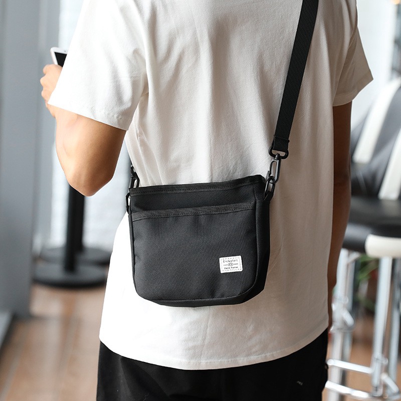 Sling bag male sale