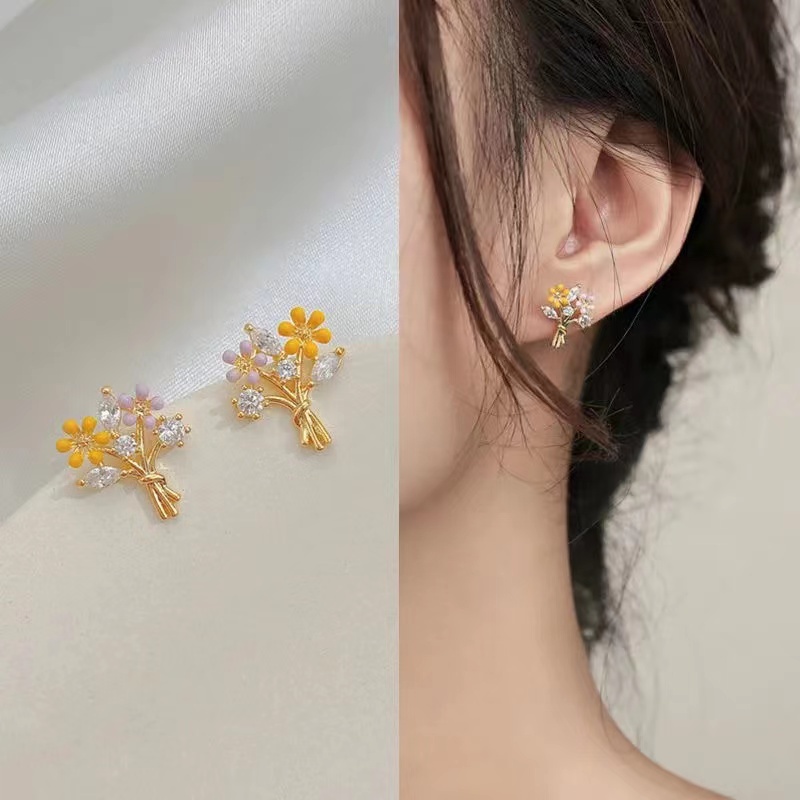 Gold on sale flower earrings