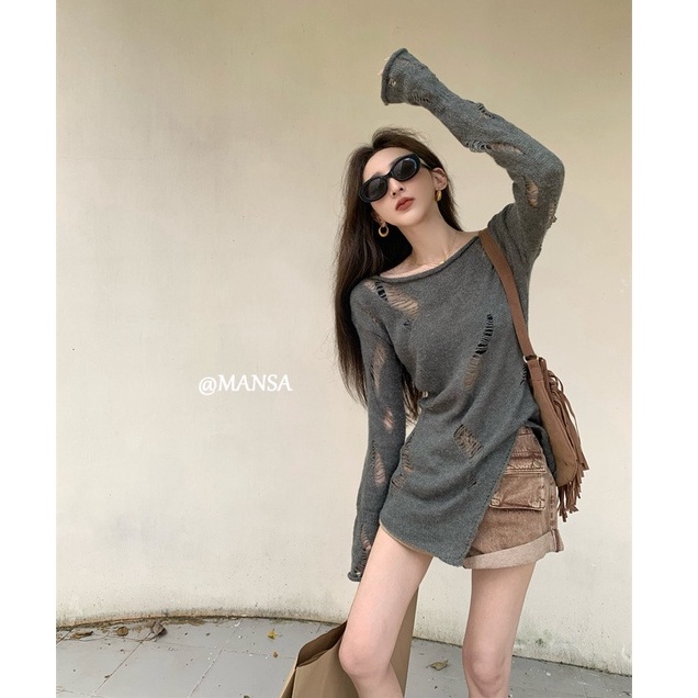 Autumn Korean fashion women's clothing design sense hole long-sleeved knitted sweater women's irregular sexy hot girl slim top