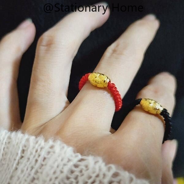 Red on sale string ring