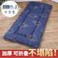 Hand pressing the blue Bunk foam mattress
