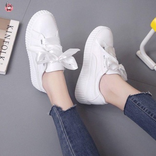 Puma white shoes hot sale with ribbon laces