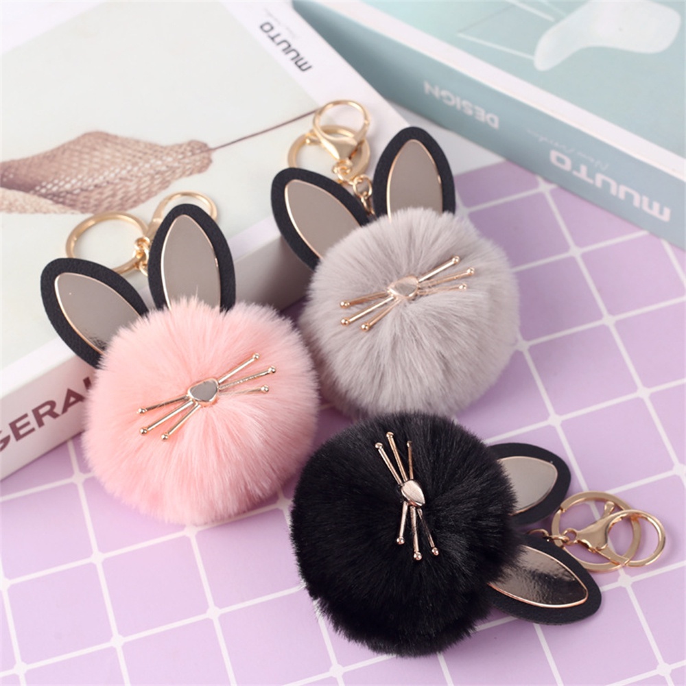 Fur pom pom sales bag charm