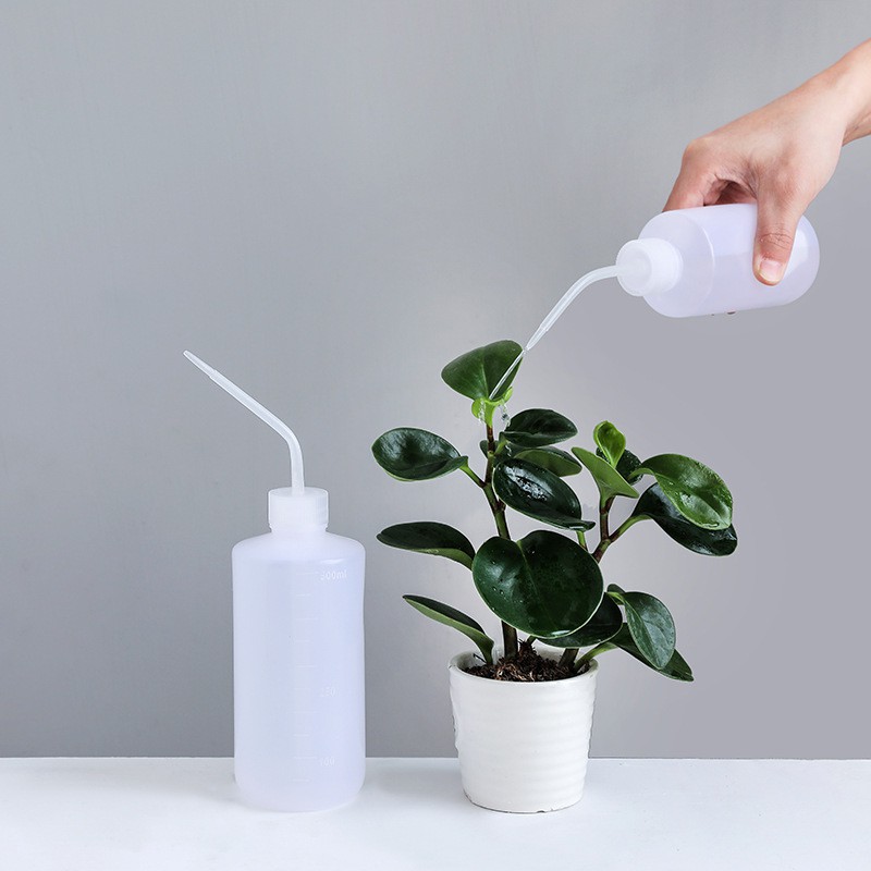 Household plastic squeeze watering bottle tip mouth watering device ...