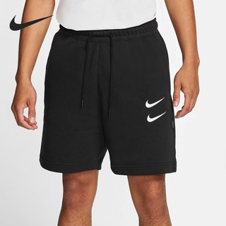 large swoosh nike shorts