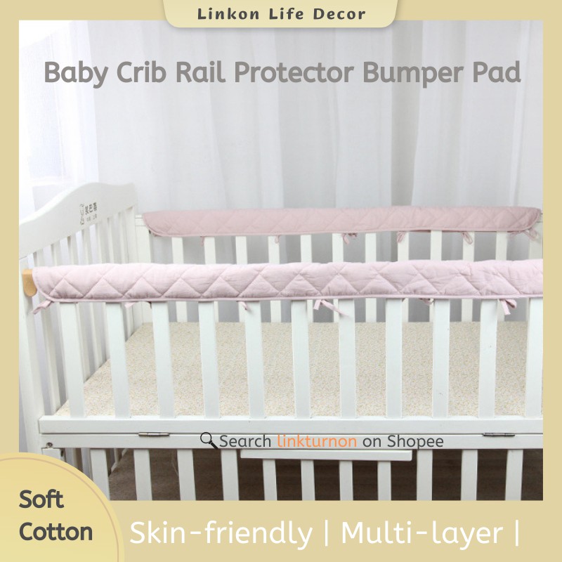 Padded crib outlet rail cover