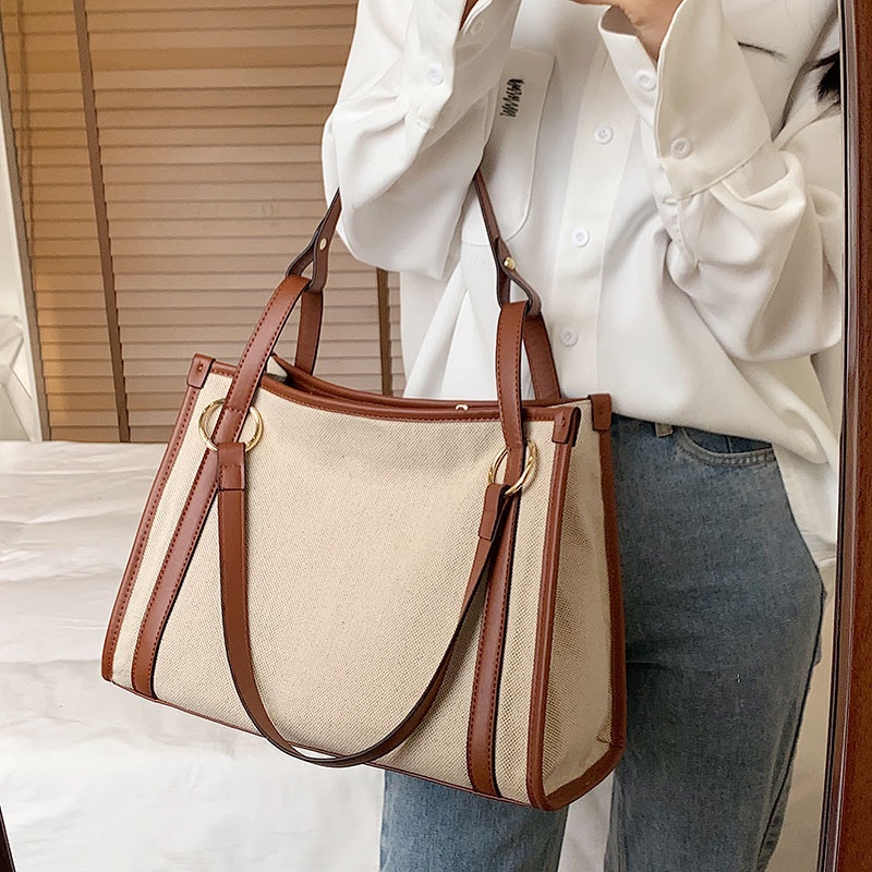 2023 ? Large-capacity ladies commuter bag 2022 new Korean version fashion hand tote bag texture casual shoulder messenger bag