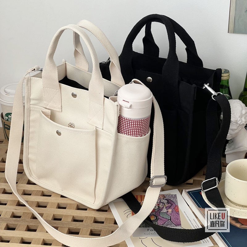 【Limited Offer】2 for $39.99 + Bonus Gift: 2023 Original Japanese Canvas Tote Bag - Spacious, Trendy & Functional | Ideal for Travel, Water Bottle Storage | Off-White, Brown, Black, Light Green