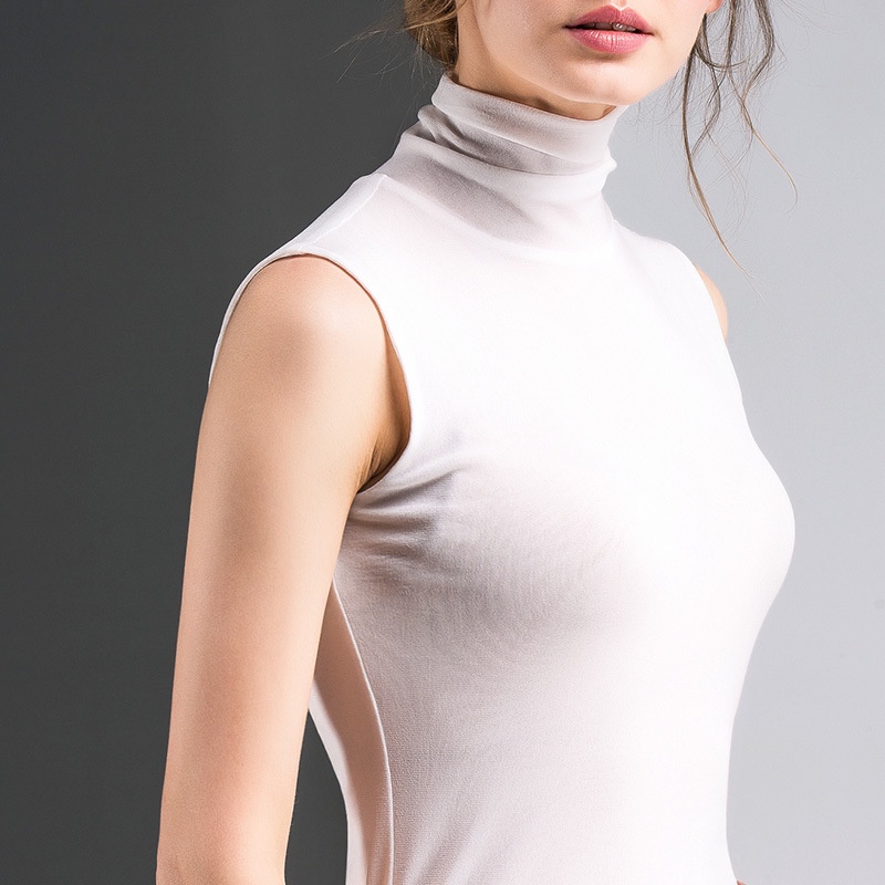 White sleeveless roll neck on sale top