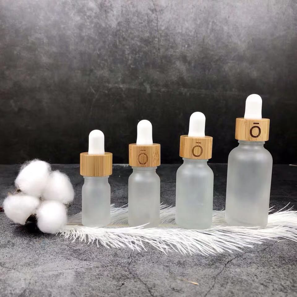 Bamboo essential oil is bottled, bamboo essential oil, glass drop tube bottle, frosted glass