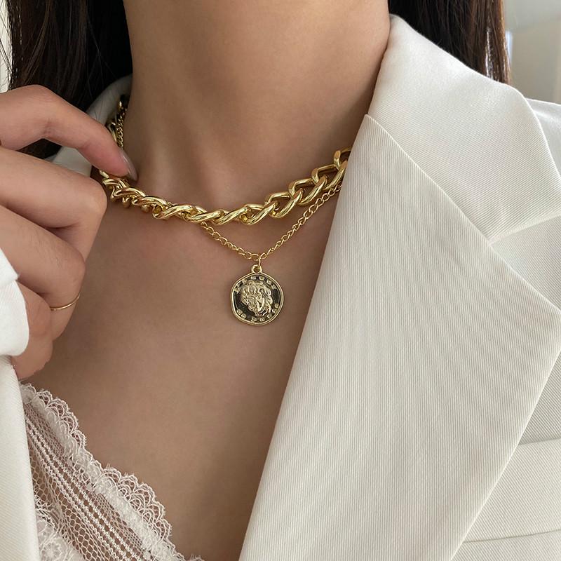 Gold coin necklace on sale layered