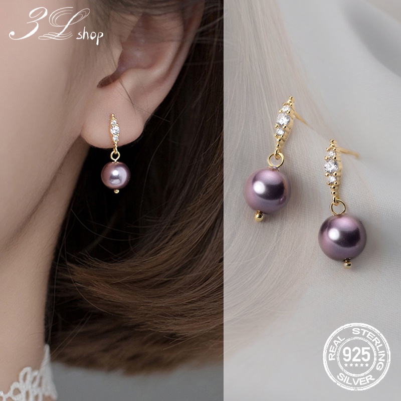 Purple and store gold earrings