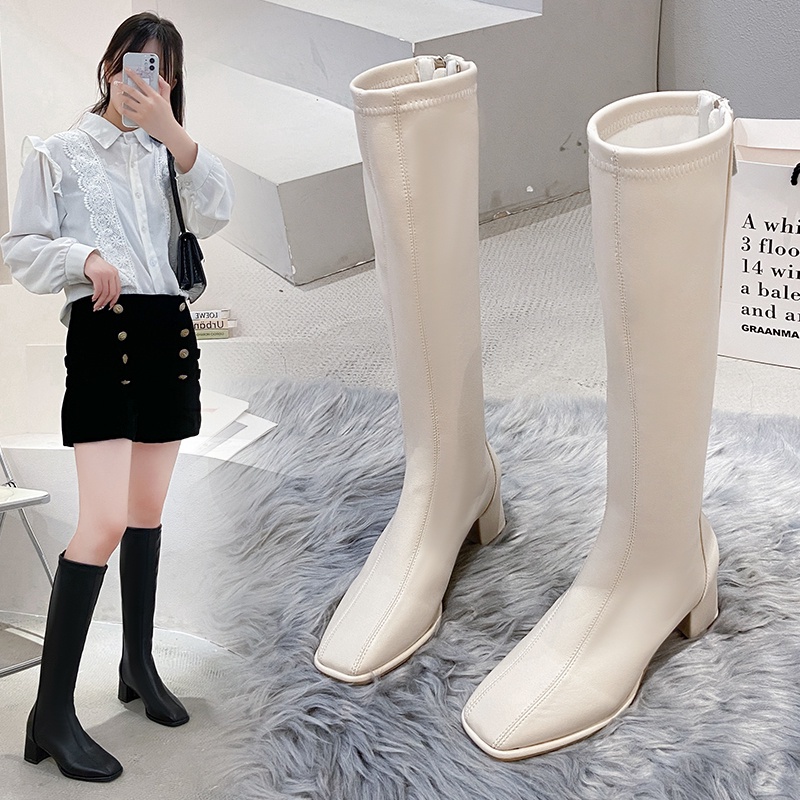 White knee high on sale boots no heel