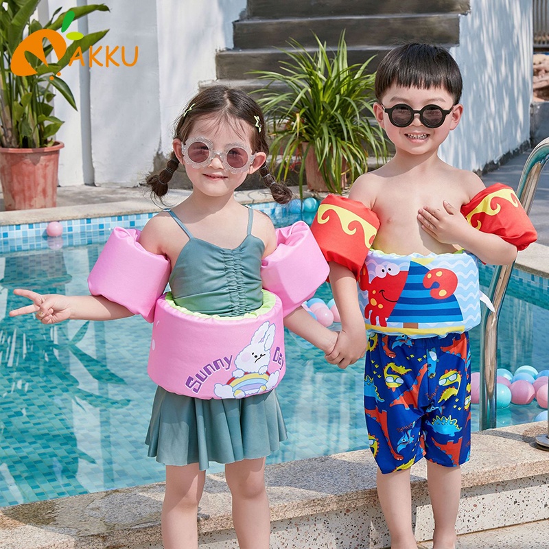 Child's swimming costume with on sale floats