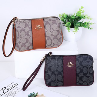 Coach pouch wallet online price