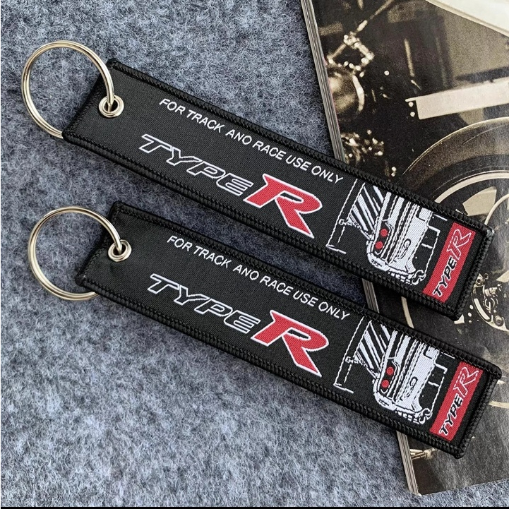 Racing car store keyring