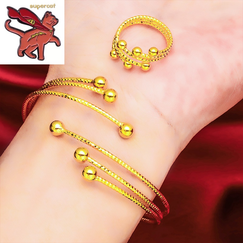 Gold bracelet with on sale bells