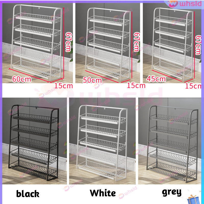 A small shelf shop snack rack is displayed in front of the cash ...