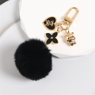 White pom pom on sale keychain