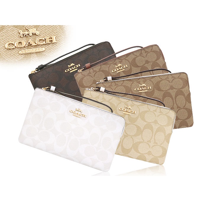 Coach Large Wristlet good In Signature Canvas