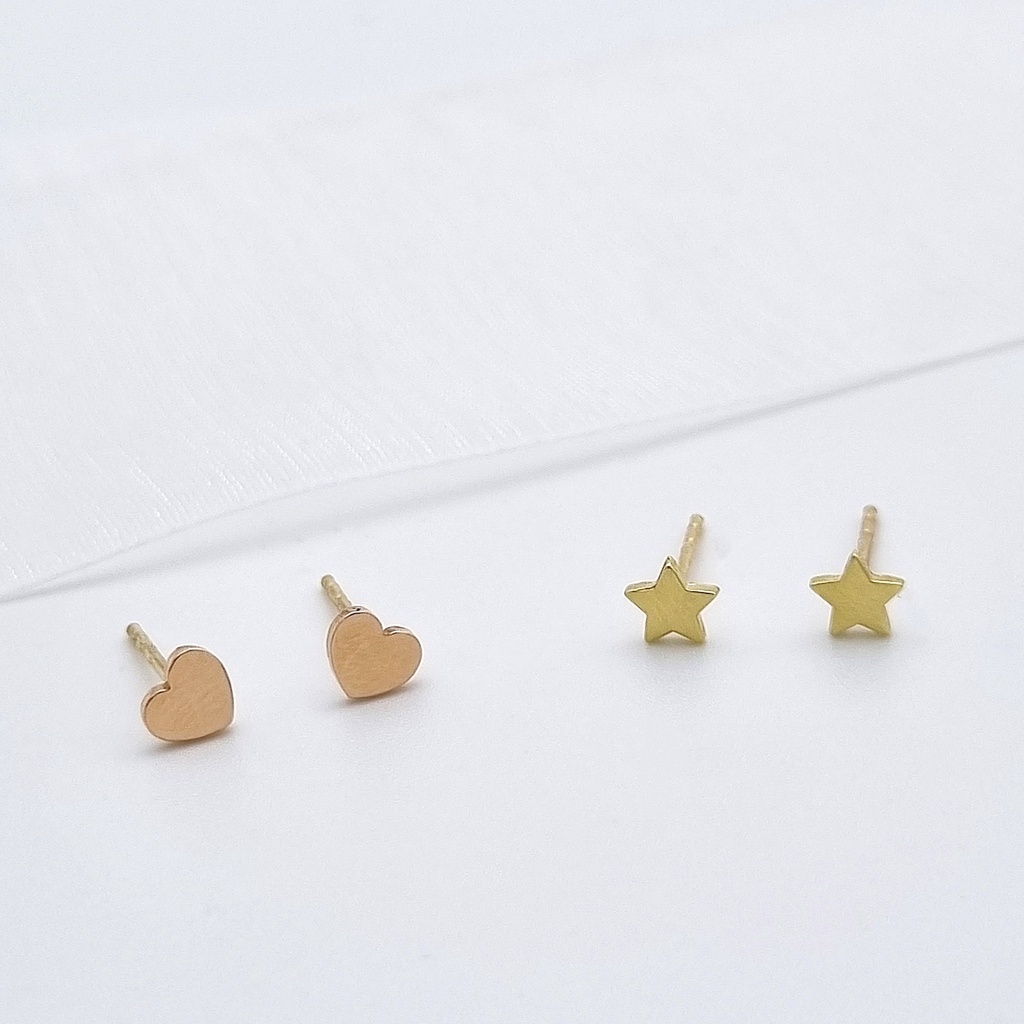 Gold star stud on sale earrings