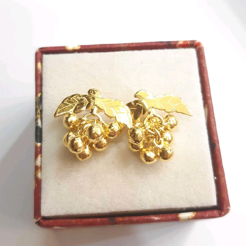 Gold earrings hot sale 24 carat