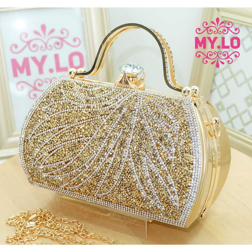 Gold sequin clutch on sale purse