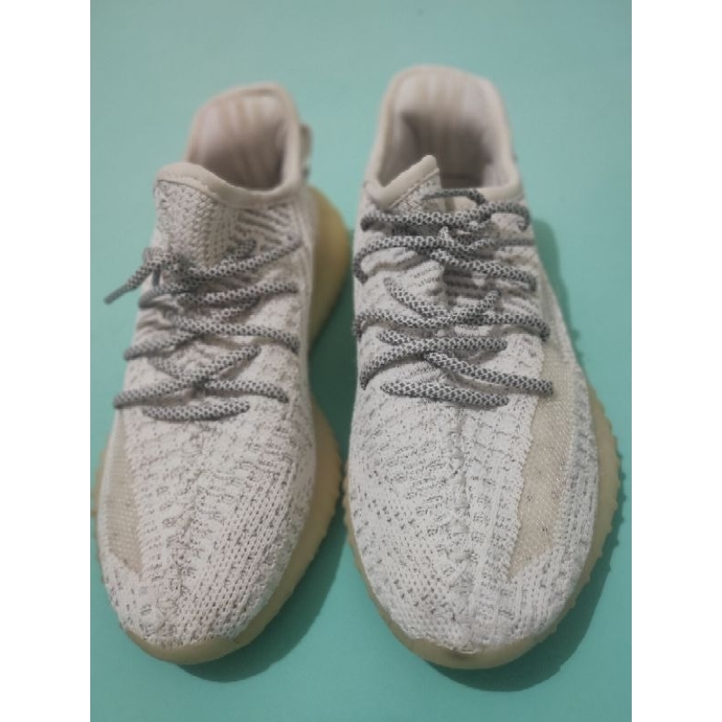 Adidas yeezy triple white singapore best sale