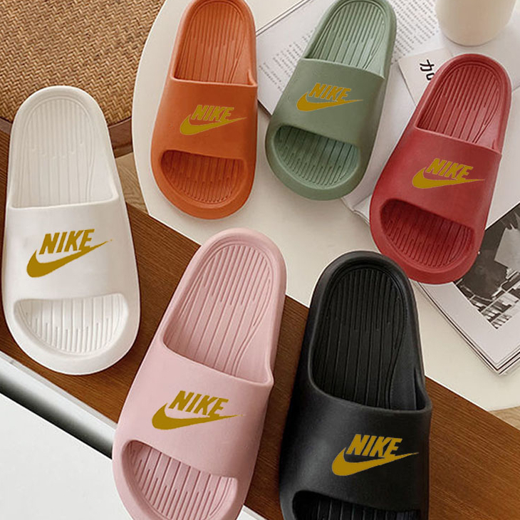 Red and gold deals nike slippers