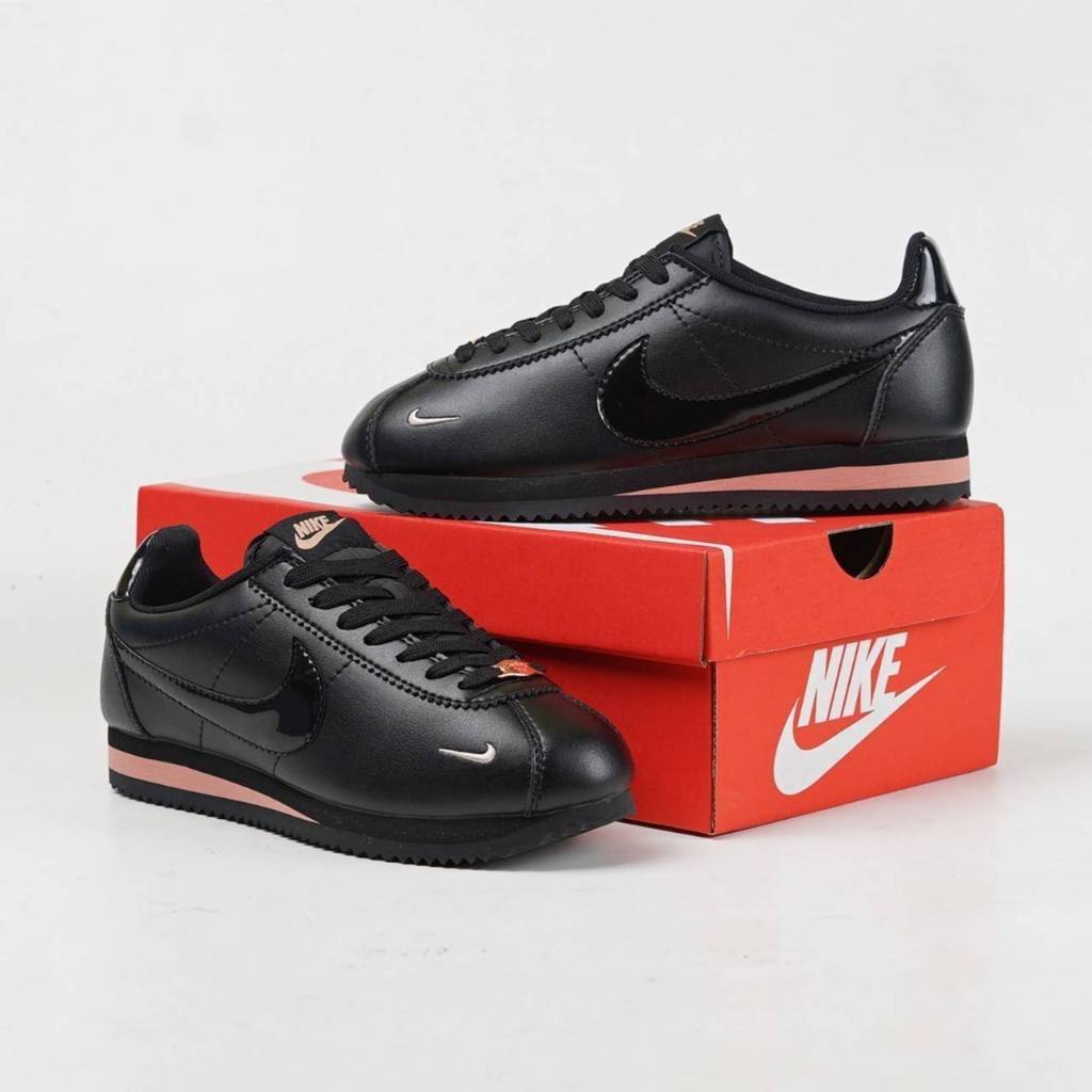 Nike cortez rose 2024 gold et noir