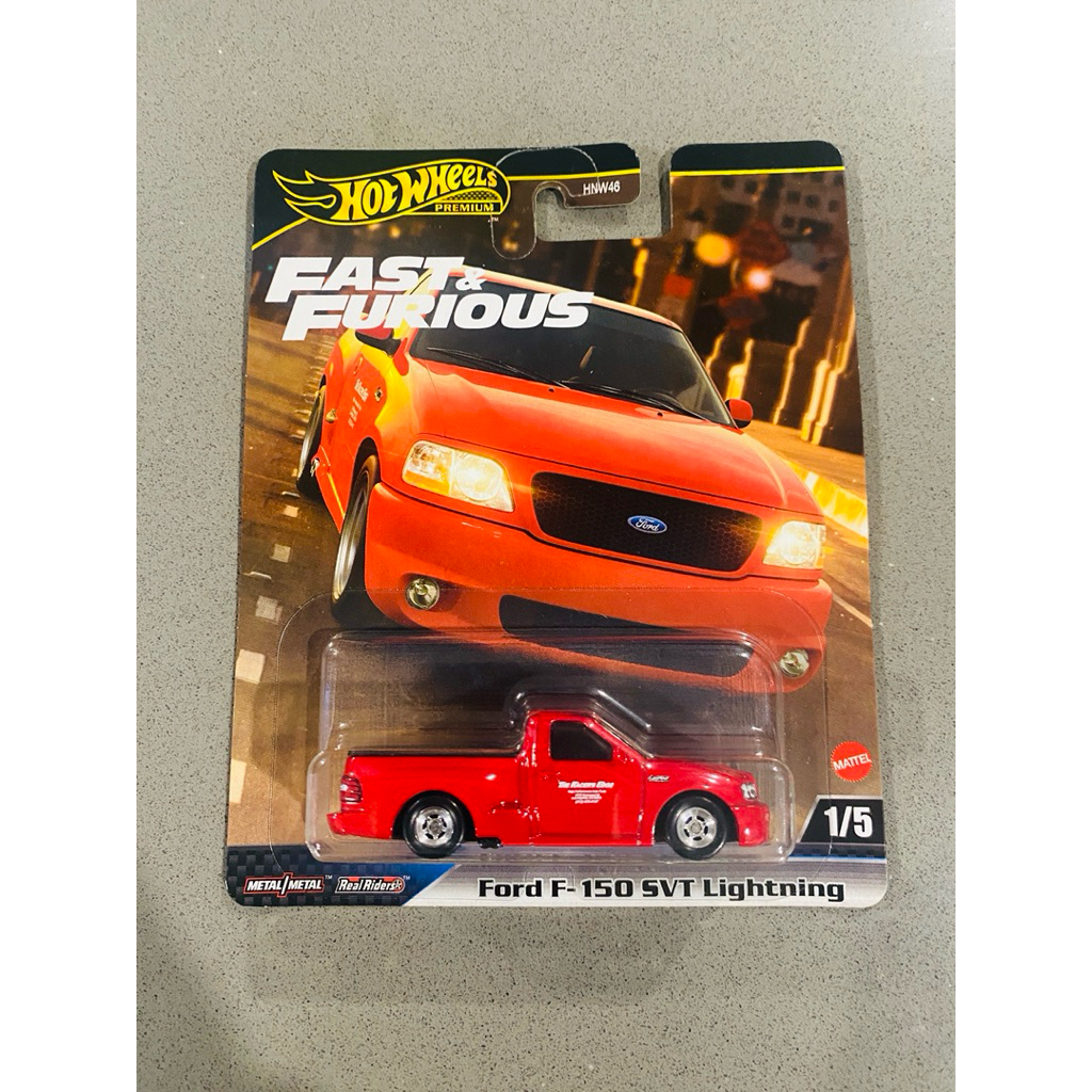 Hot Wheels Premium die-cast model of a red Ford F-150 SVT Lightning ...