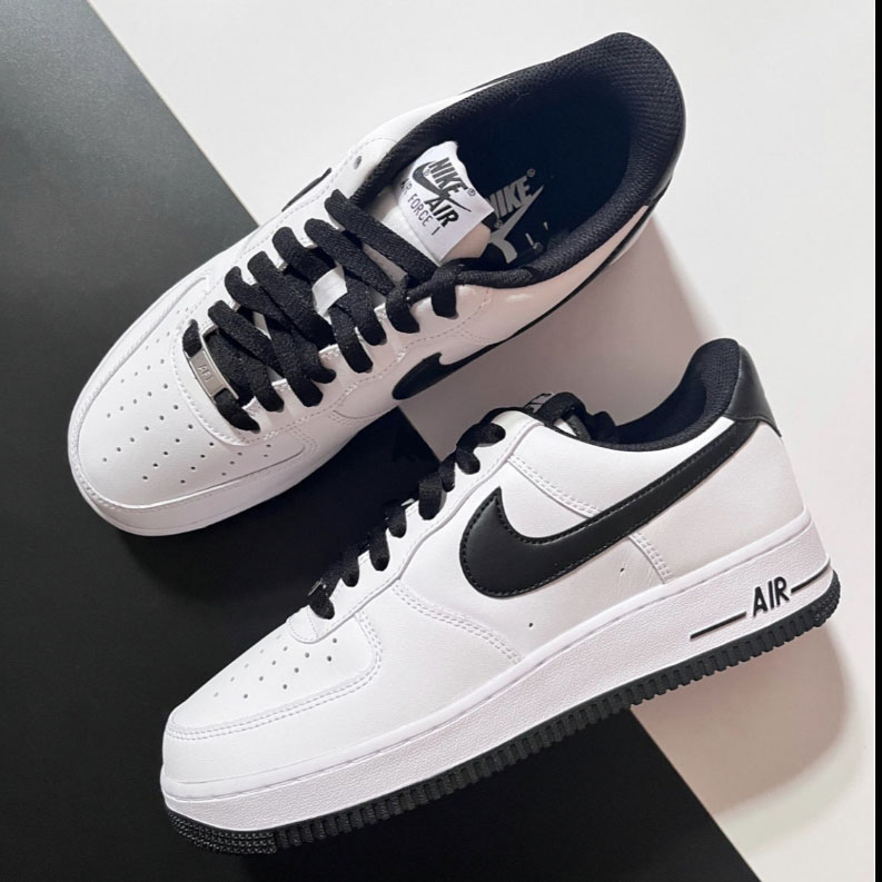 Air force 1 on sale black and white swoosh