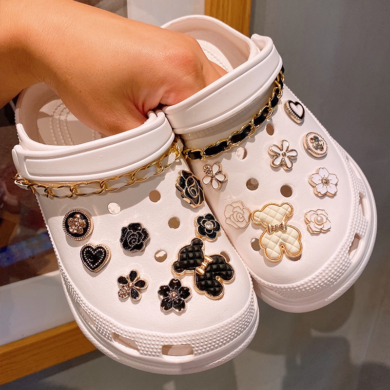 White crocs deals with charms