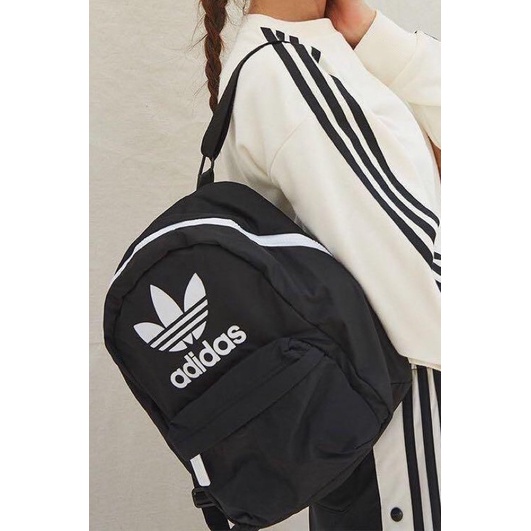 coach horse and carriage imprenited on backpack Hitch with Print Color:TEAM ORANGE product_tag lined cobblestone street in adidas Tennis Bags for