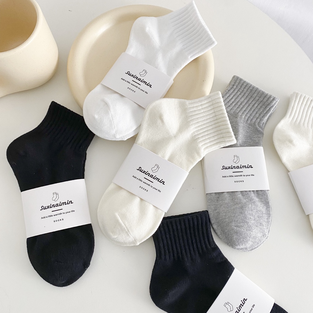 Men's and women's universal medium tube socks black and white solid ...