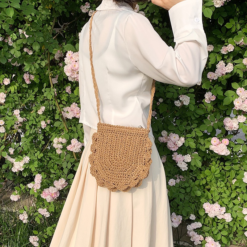 Summer new solid color casual woven bag hollow ladies half round