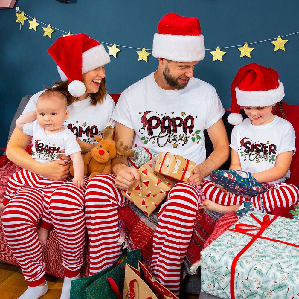 Mum dad and store baby matching christmas outfits