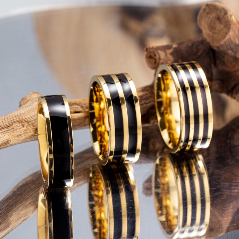 Gold black wedding on sale band