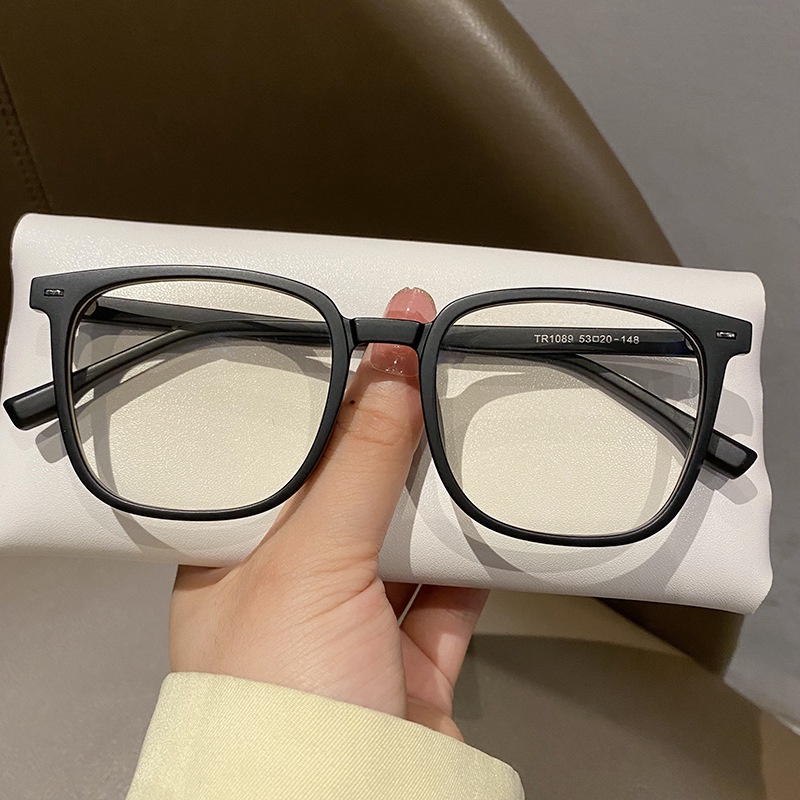 Black frame glasses on sale with blue lenses