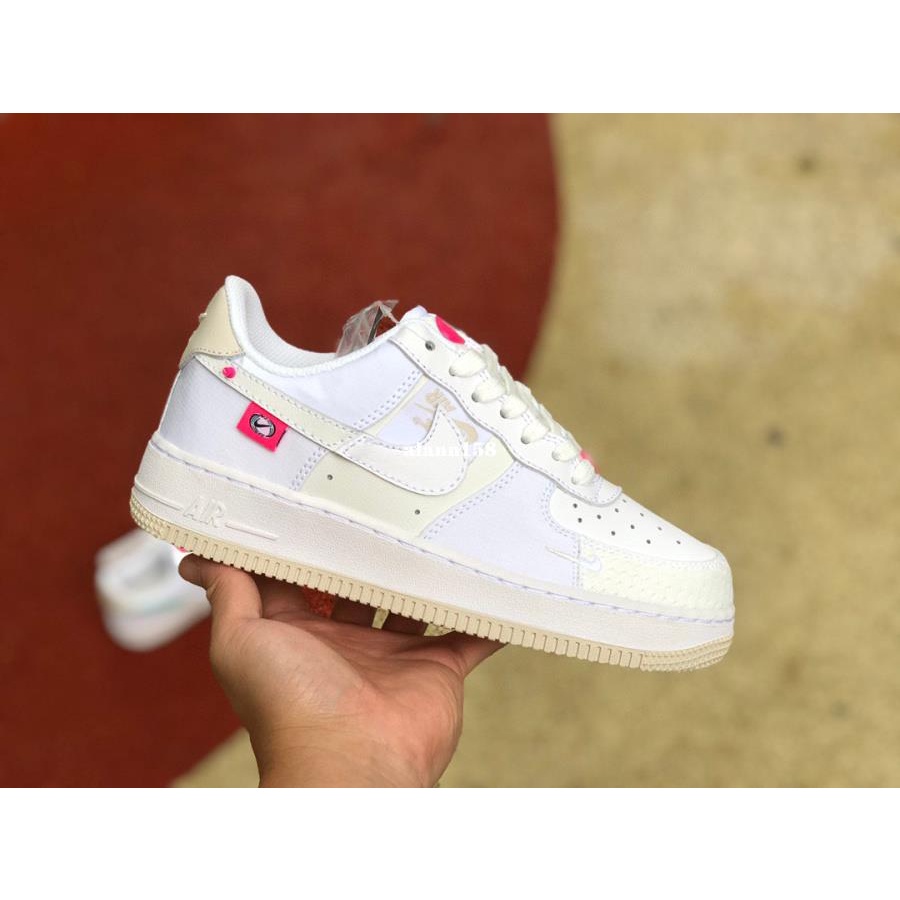 Air force 1 hot sale white with pink