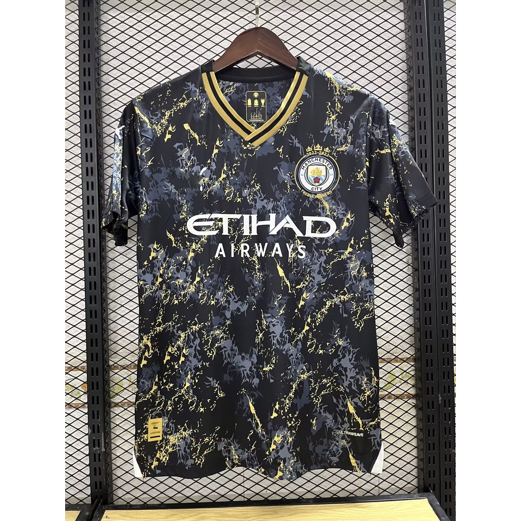 Man city black and cheap gold kit