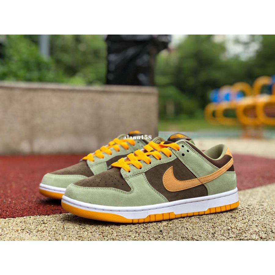 Olive green nike hotsell dunks with organge inside