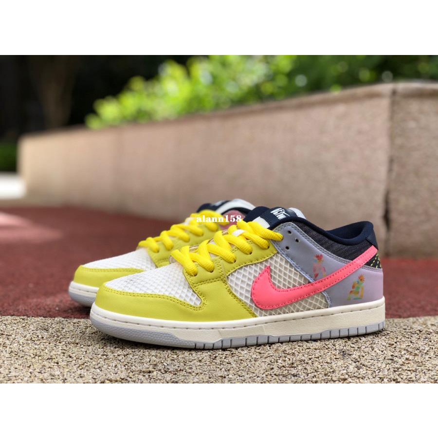 Pink yellow hotsell blue nike shoes