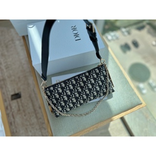 Authentic Dior Oblique Jacquard Vertical Lock Pouch with Strap, Luxury, Bags  & Wallets on Carousell