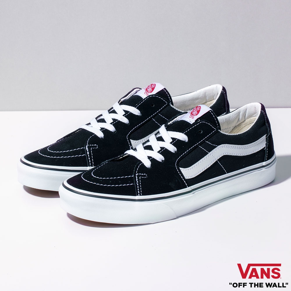 Low top white and black vans hotsell