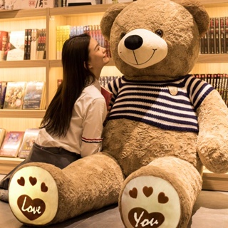Image of sexy slim woman hugging big teddy bear, Stock Photo