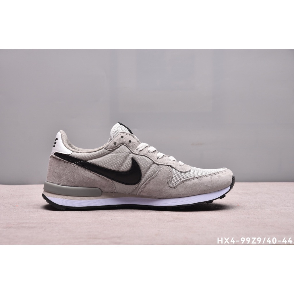 nike internationalist light silver