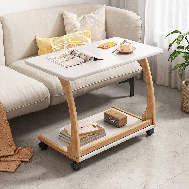 A few side tables by the sofa, a movable solid wood tea table for ...